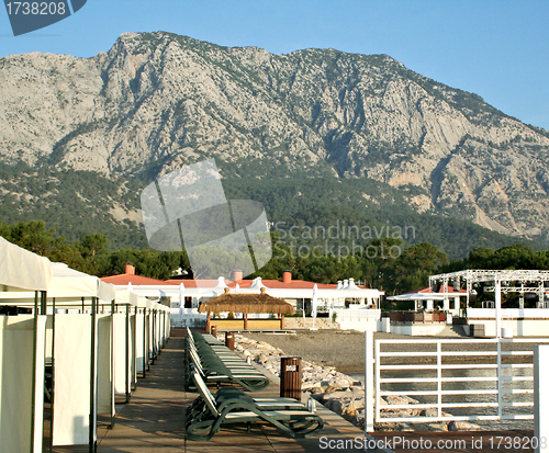 Image of Sky, ocean, mountain, beach, and buildings