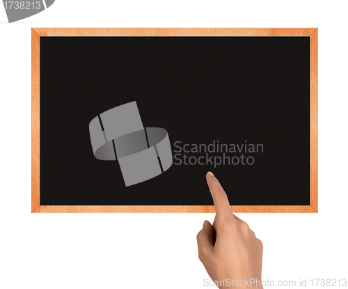 Image of clean chalkboard with hand and copy space