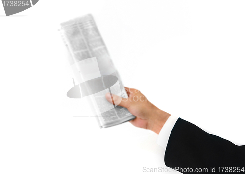 Image of newspaper in the hand