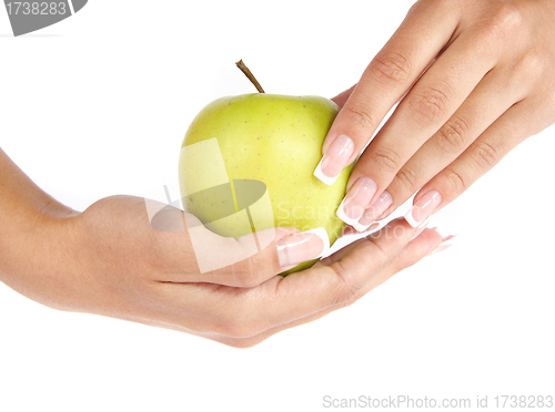 Image of Hand with apple isolated on white