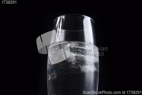 Image of glass with ice cubes isolated