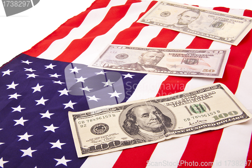 Image of dollars on american flag