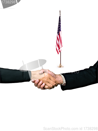 Image of hand shake and a American flag