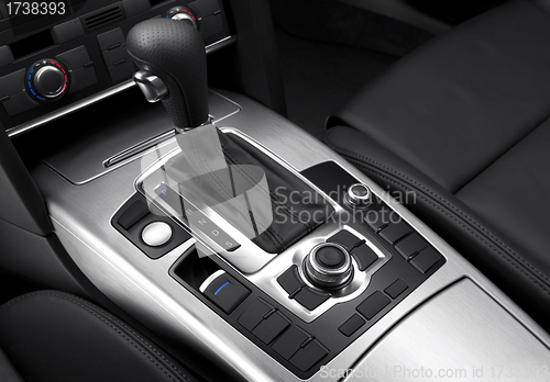 Image of close up view of car gearshift and details