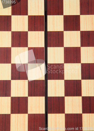 Image of An old wooden chess board