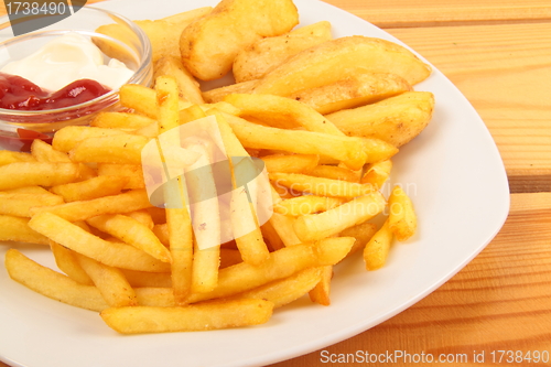 Image of french fries and ketchup close up