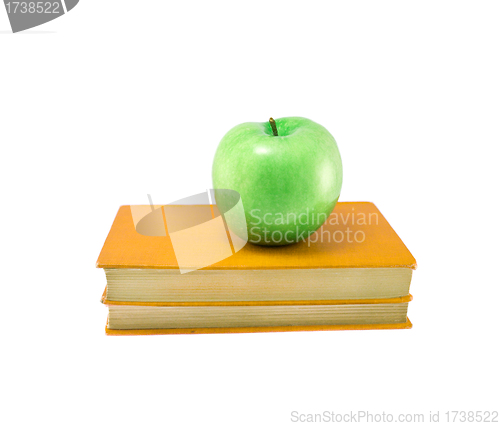 Image of book with apple isolated on white background