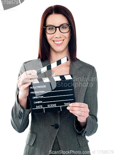 Image of Business lady holding clapperboard