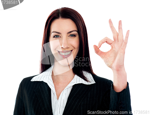 Image of Excellent gesture from young businesswoman