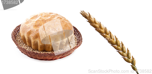 Image of fresh baked roll with grain in a basket