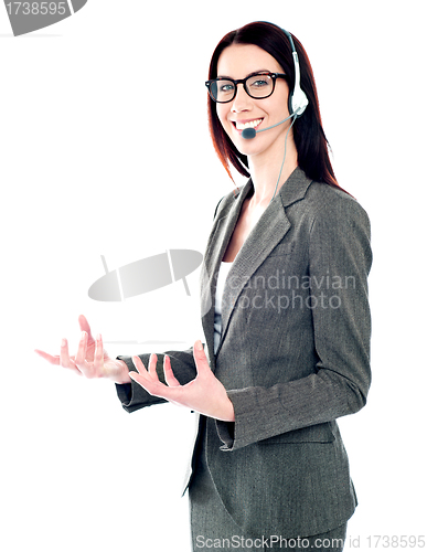 Image of Smiling telemarketing girl posing in headsets