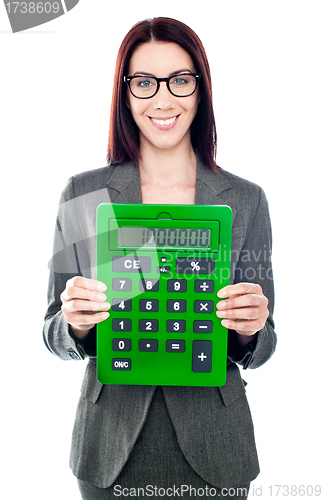 Image of Business woman with a calculator