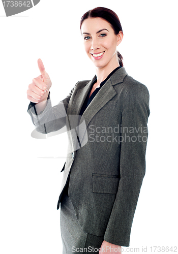 Image of Successful business lady showing thumbs-up