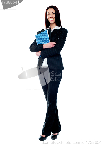 Image of Isolated business woman holding documents