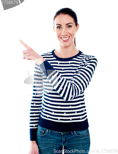 Image of Woman pointing index finger at something