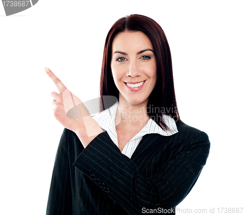 Image of Business lady pointing at copyspace