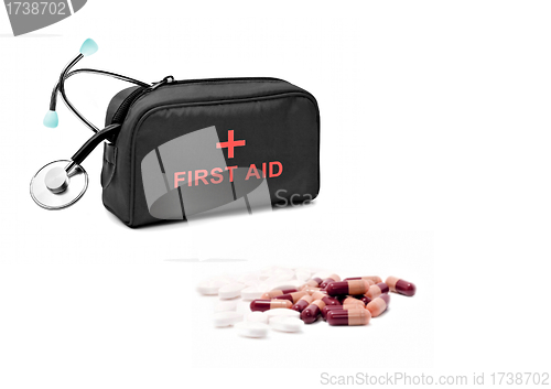 Image of First aid kit and pills