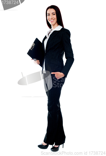 Image of Full length of young businesswoman