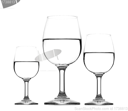 Image of three glass of water half empty isolated
