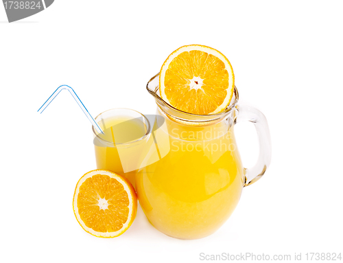 Image of Orange juice in pitcher and oranges