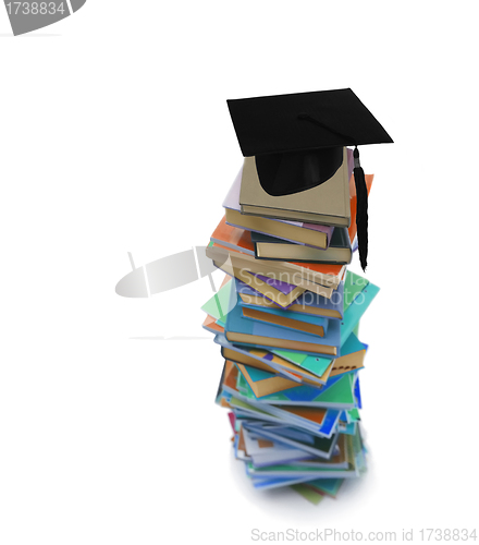 Image of Student hat on books