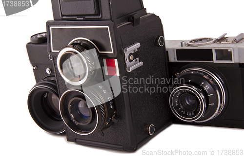 Image of three old cameras