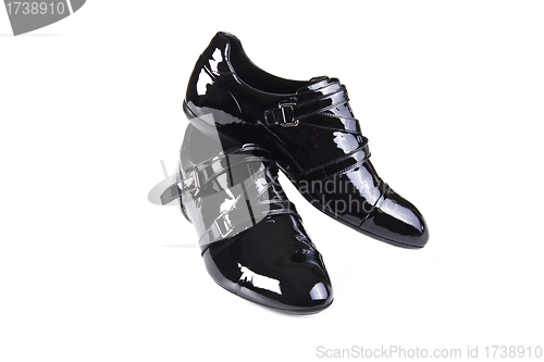 Image of black shiny man's shoe