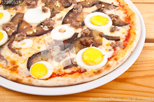 Image of Pizza with egg and cheese