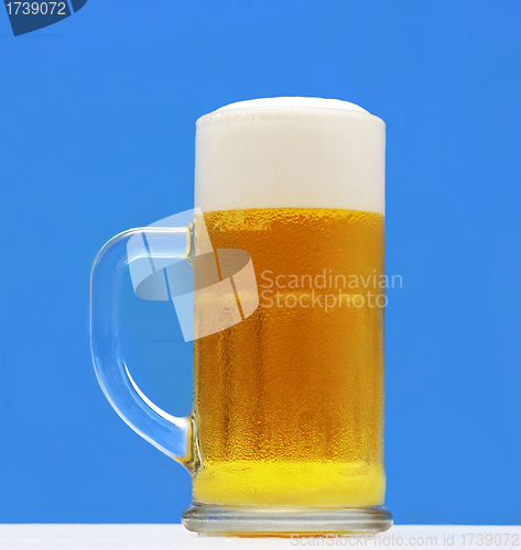 Image of Beer glass on a blue background