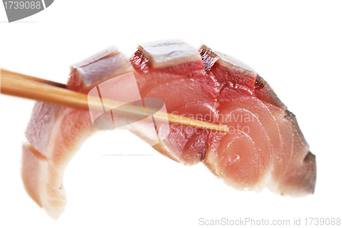 Image of A piece of fish meat in chopsticks