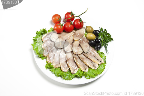 Image of slices smoked fish and vegetables