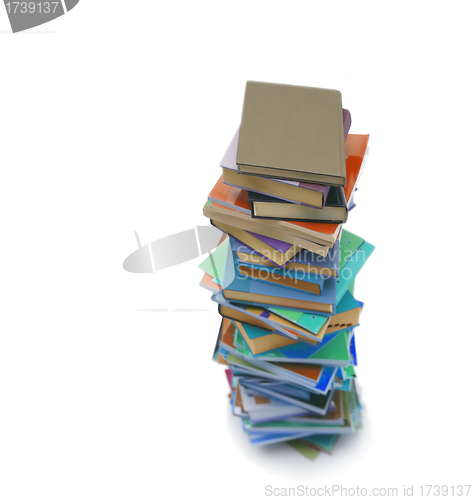 Image of Stack of colorful real books on white background, partial view.
