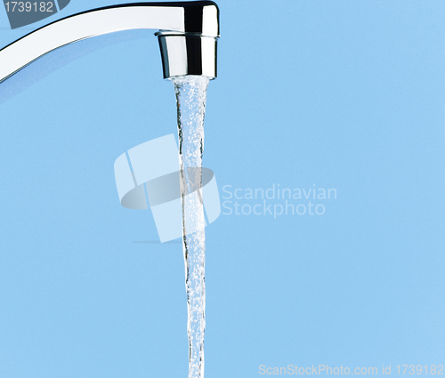 Image of Water is floating from a tap in the kitchen