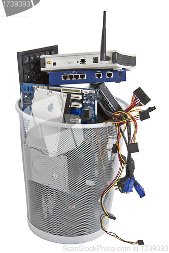 Image of electronic scrap in trash can