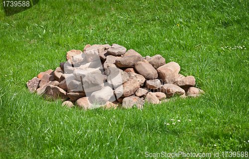 Image of Pile of stones on field