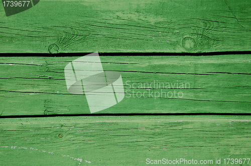 Image of Background green paint wooden board wall closeup 