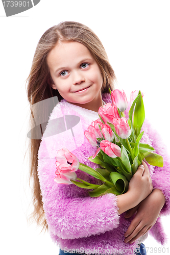 Image of beautiful  little girl with bouquet of pink tulips isolated on white