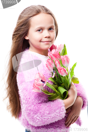 Image of beautiful  little girl with bouquet of pink tulips isolated on white