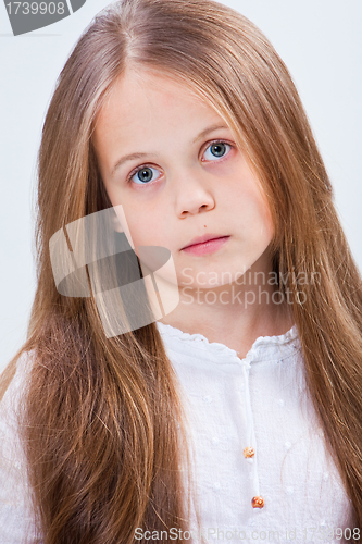 Image of beautiful little girl with long blonde hair