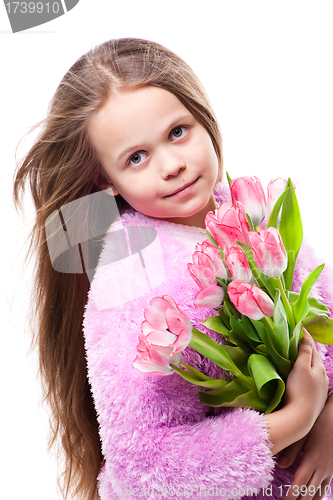 Image of beautiful  little girl with bouquet of pink tulips isolated on white