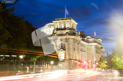 Image of The Reichstag Parliament building night car light streaks Berlin