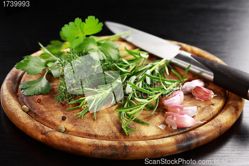 Image of Herbs on wooden platter