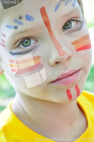 Image of child with paintings on his face