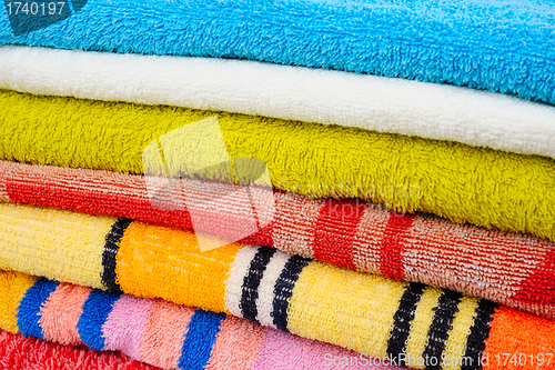 Image of Colorful towels isolated on white background