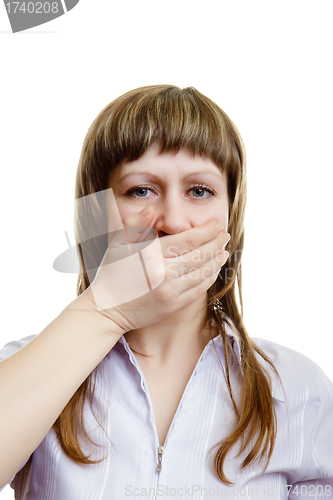 Image of young girl covers her mouth with his hands