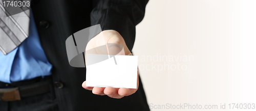 Image of businessman giving business card