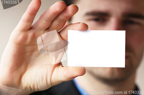 Image of man shows his business card