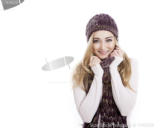Image of young beautiful woman with scarf and hat 