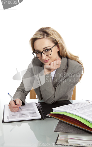 Image of young successful business woman in the office