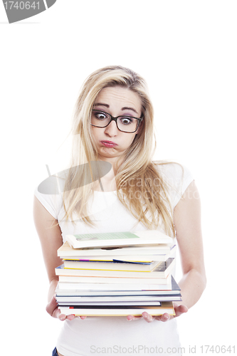 Image of young woman with a lot of books